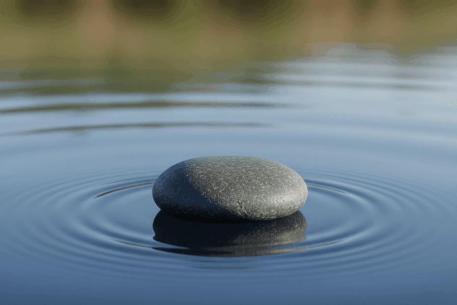 Smooth stone resting on calm water with soft ripples, symbolising Stoic reflection and real-world calm