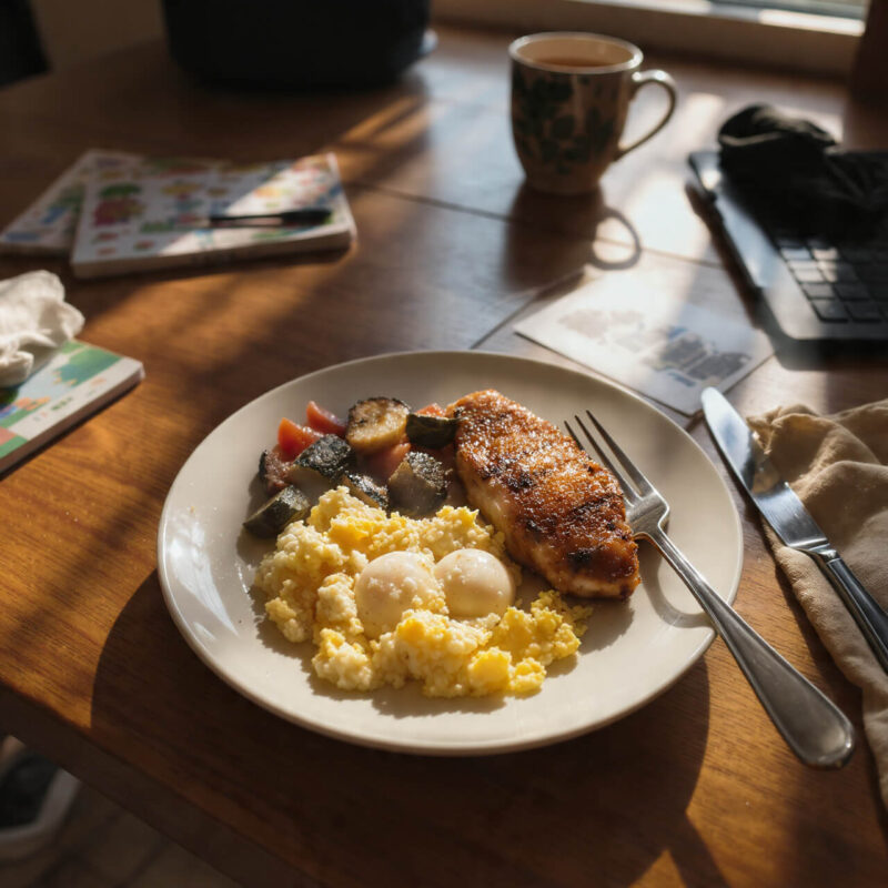 Simple home-cooked meal with protein vegetables and whole foods on kitchen table
