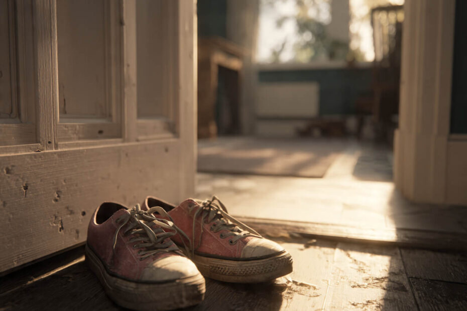 Worn trainers by an open front door with evening light a visual reminder to beat decision fatigue by moving before your brain negotiates